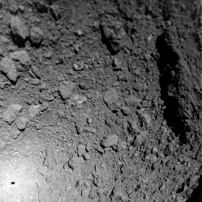 The surface of Ryugu and MASCOT’s shadow (lower left).